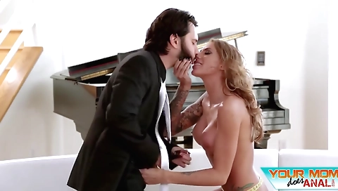 Mature chick fucks with a dildo